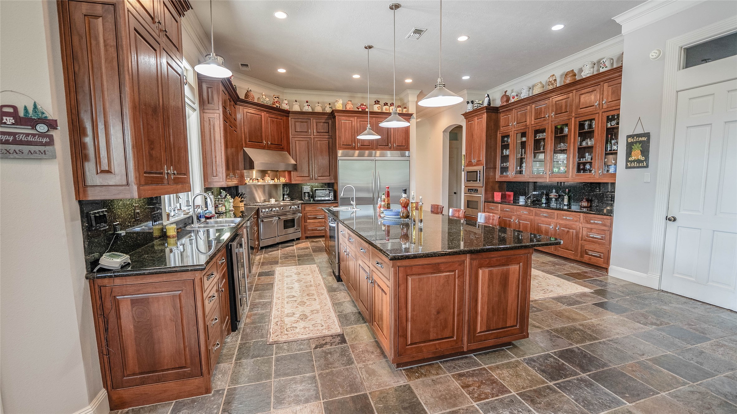 2042 22 Hills Road Gause, TX 77857 - Photo 20 of 50 a kitchen with stainless steel appliances granite countertop a sink and cabinets