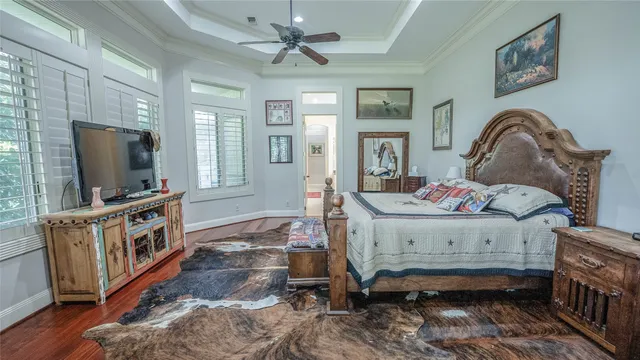 a bathroom with a tub sink and a mirror