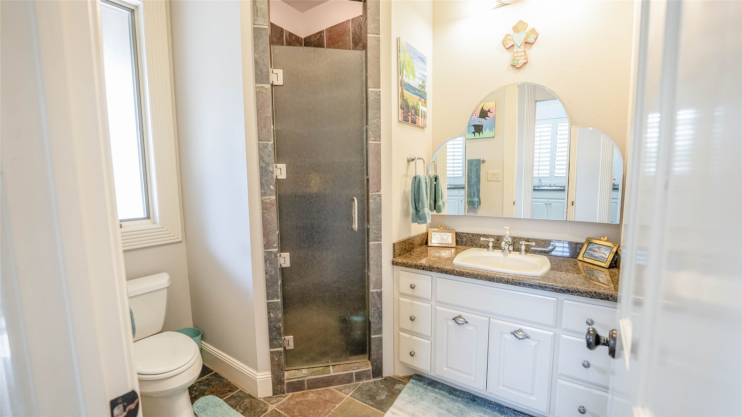 2042 22 Hills Road Gause, TX 77857 - Photo 25 of 50 a bathroom with a double vanity sink toilet and shower
