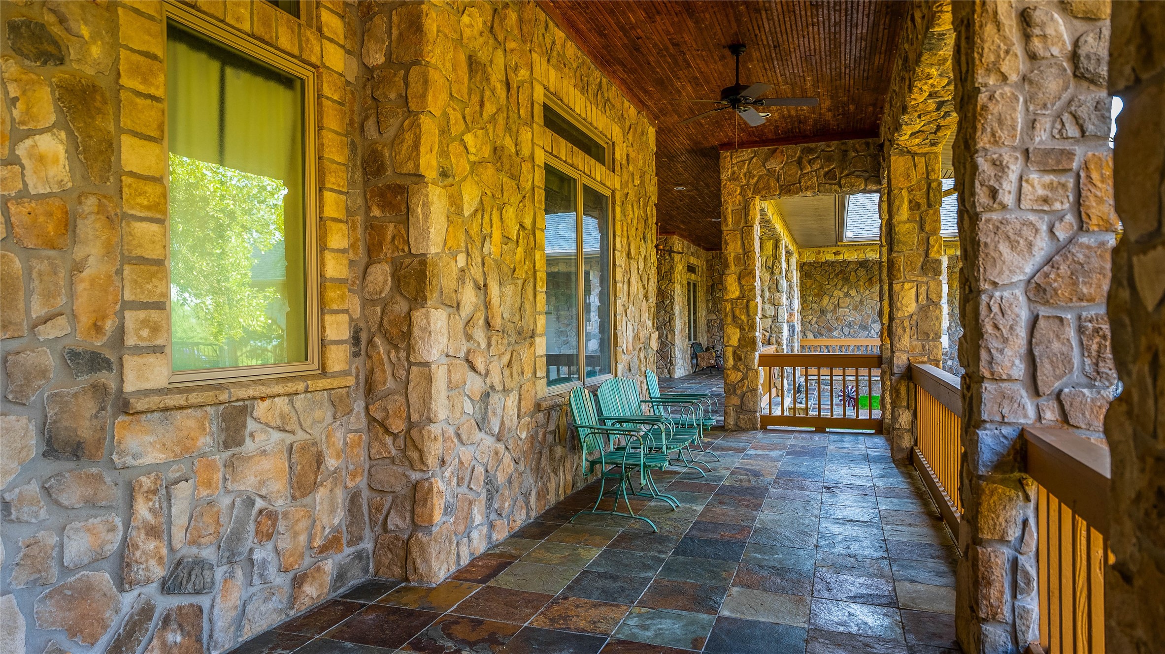 2042 22 Hills Road Gause, TX 77857 - Photo 29 of 50 a view of a brick house with a large windows and a rug