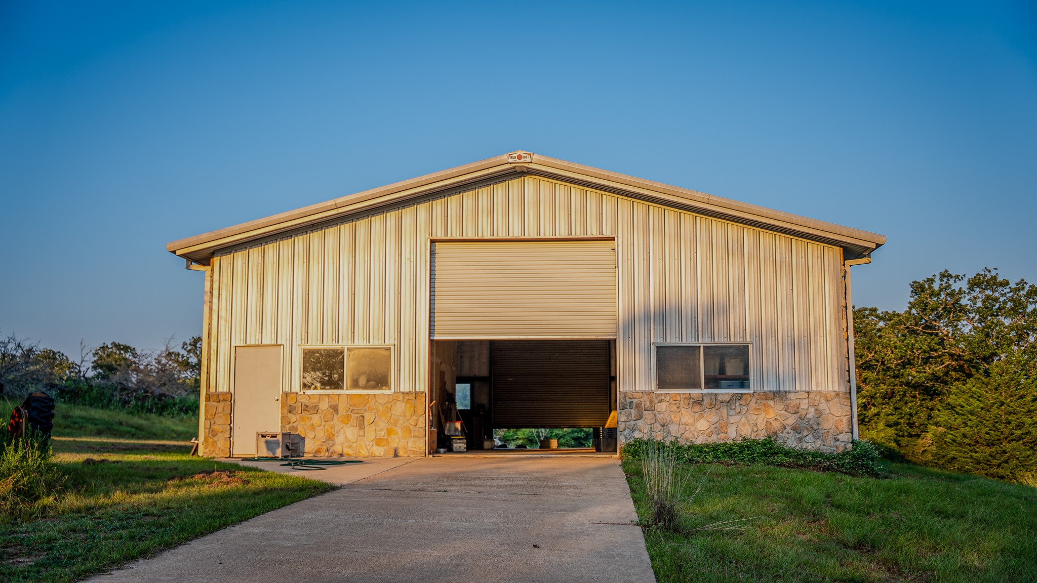 2042 22 Hills Road Gause, TX 77857 - Photo 41 of 50 a front view of a house with a garden and yard