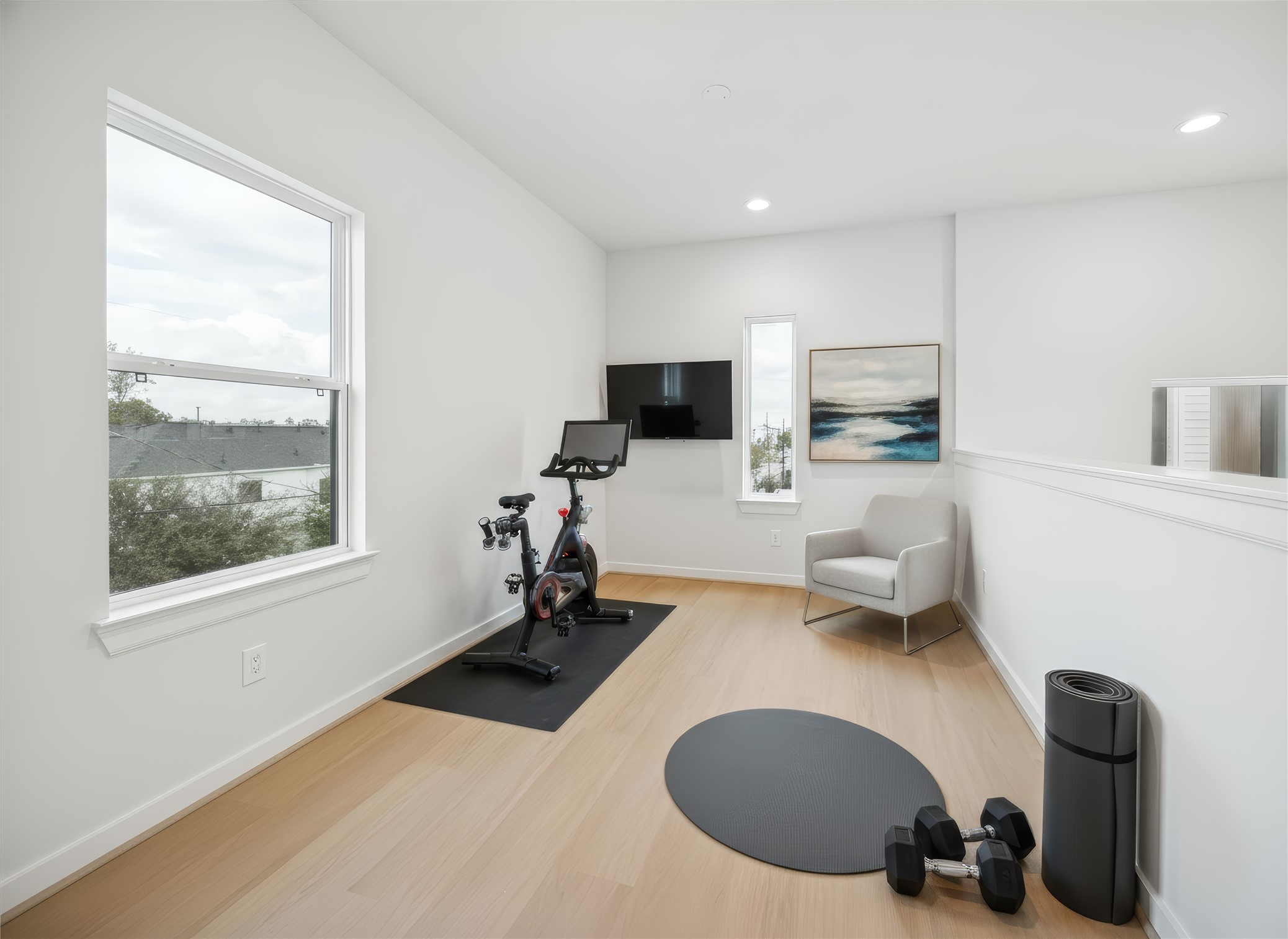 817 Thornton Road, Unit G Houston, TX 77018 - Photo 12 of 49 Third-floor study features bright windows with plenty of natural light and a view from the railing down into the living room, adding connection and openness to the space. *Virtually staged*