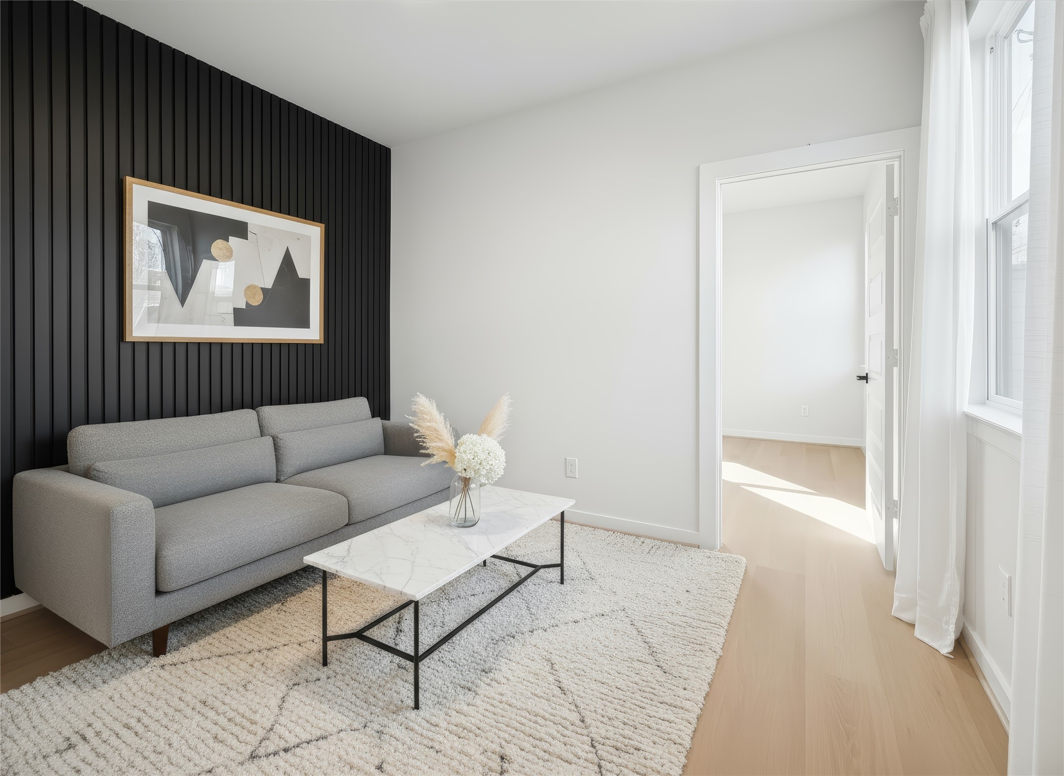 817 Thornton Road, Unit G Houston, TX 77018 - Photo 4 of 49 a living room with furniture and a rug