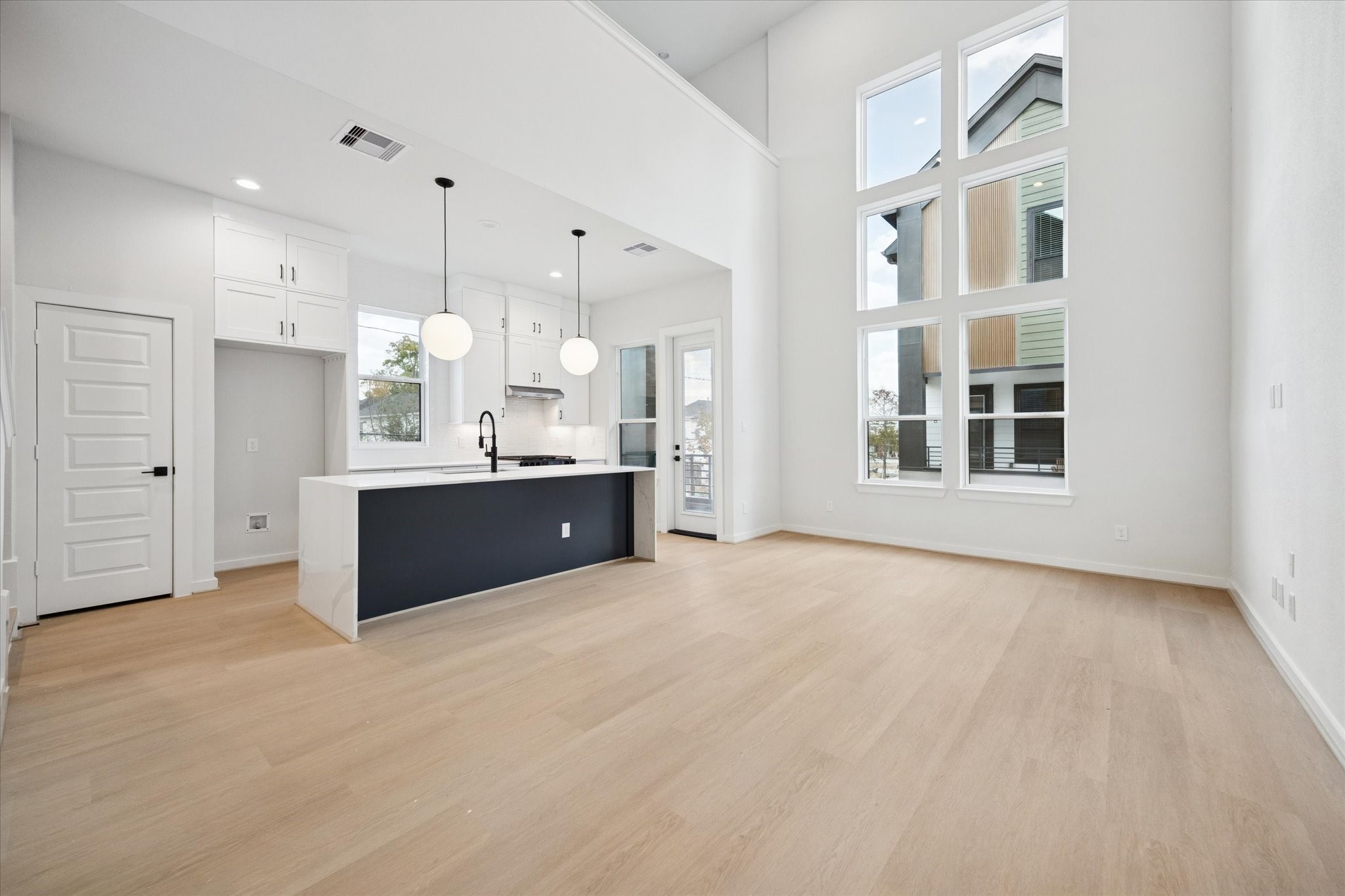 817 Thornton Road, Unit G Houston, TX 77018 - Photo 7 of 49 Entertain or unwind in this designer kitchen, every detail crafted for modern comfort and function.