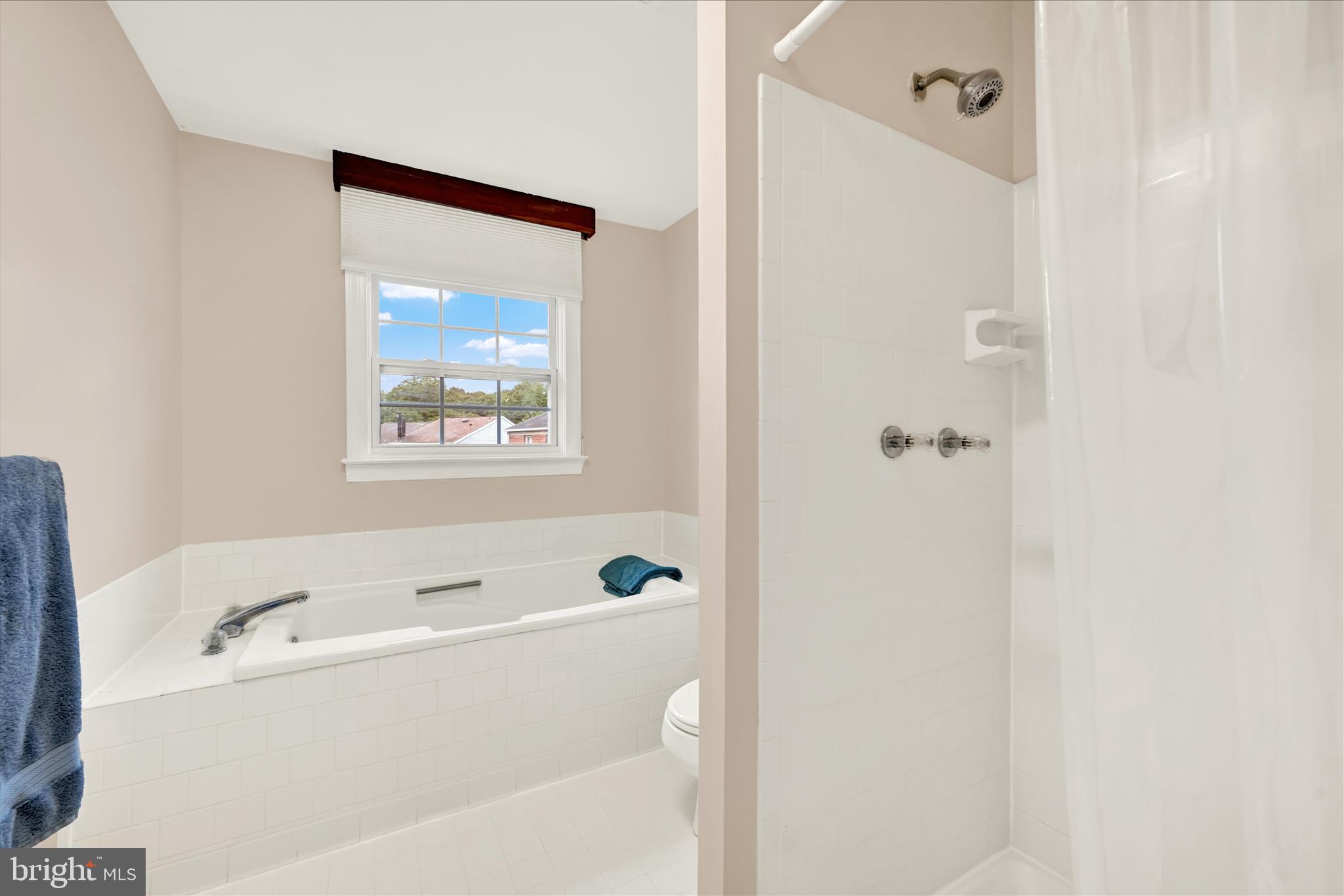 2317 Wonderview Road Lutherville-Timonium, MD 21093 - Photo 17 of 27 a bathroom with a bathtub and shower