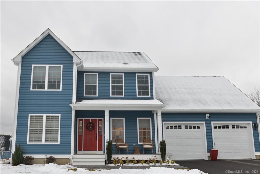 11 Gino Drive Bristol, CT 06010 - Photo 1 of 1 a front view of a house with a garden