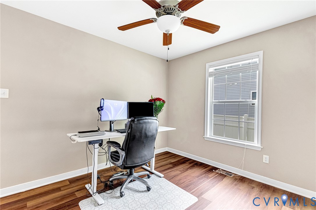 9925 Reymet Court Richmond, VA 23237 - Photo 24 of 30 a view of a workspace with furniture and a window