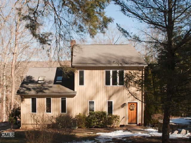 43 Spring Trail Newtown, CT 06482 - Photo 1 of 1 a view of a white house with a large tree