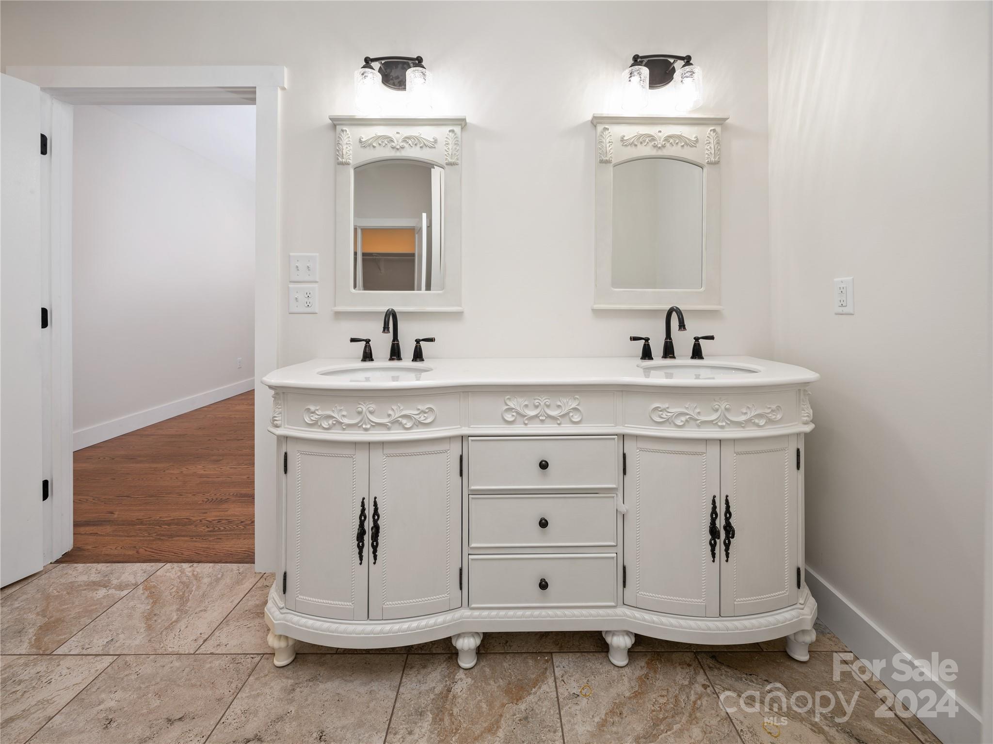 359 Tiptop Road Brevard, NC 28712 - Photo 15 of 48 a bathroom with a sink and a mirror