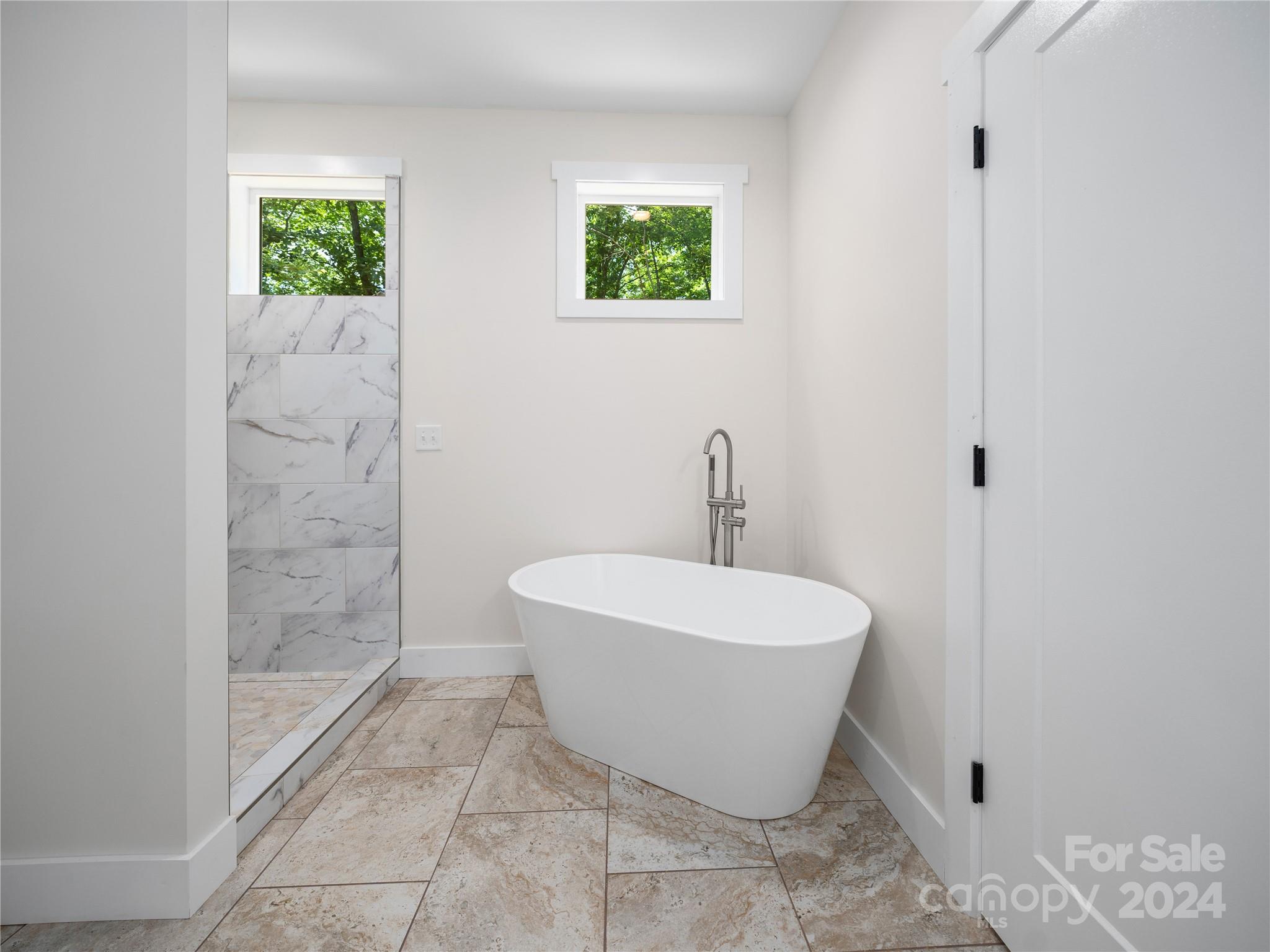 359 Tiptop Road Brevard, NC 28712 - Photo 17 of 48 a bathroom with a sink and a mirror