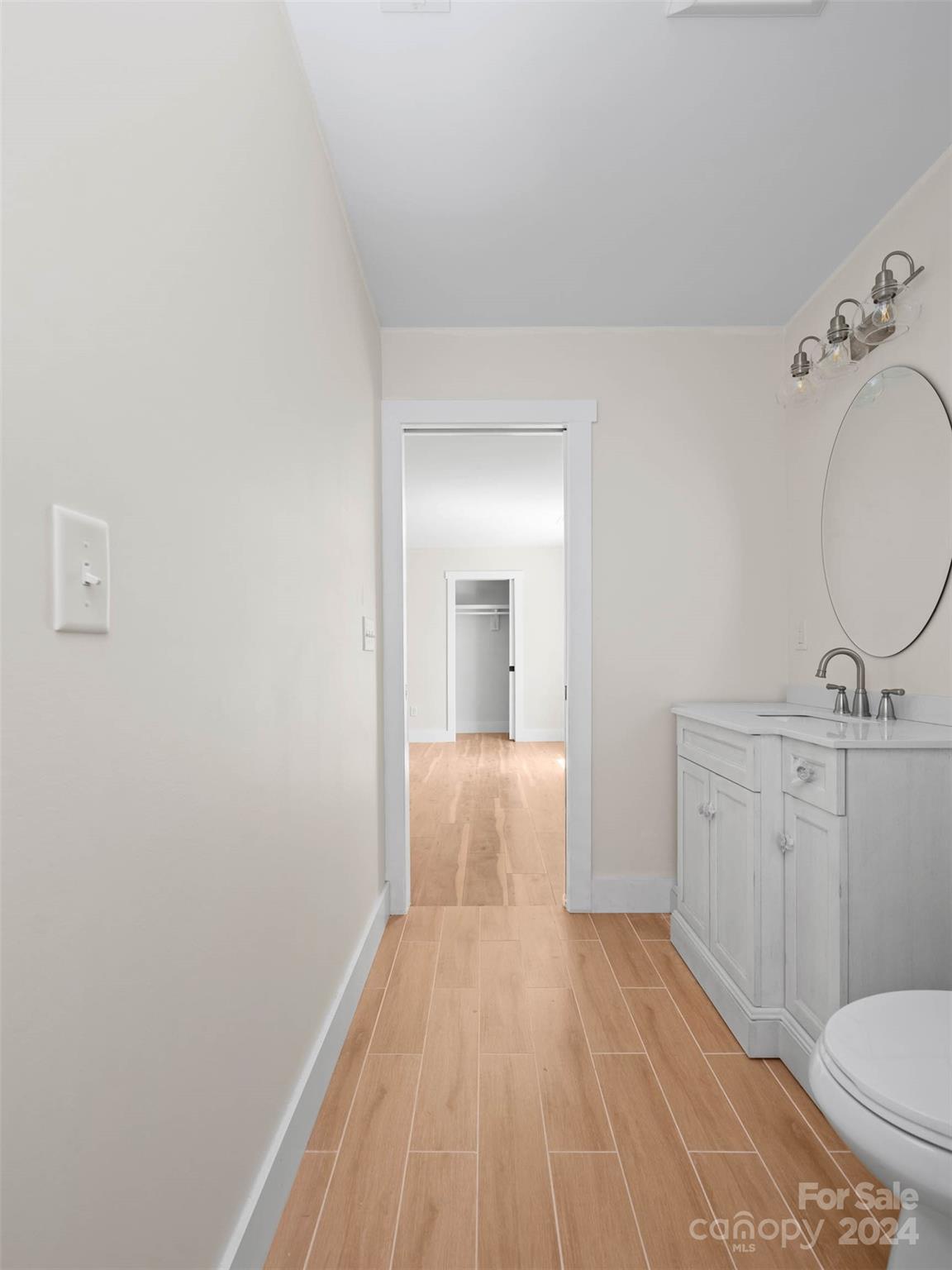 359 Tiptop Road Brevard, NC 28712 - Photo 25 of 48 a spacious bathroom with a sink and a mirror