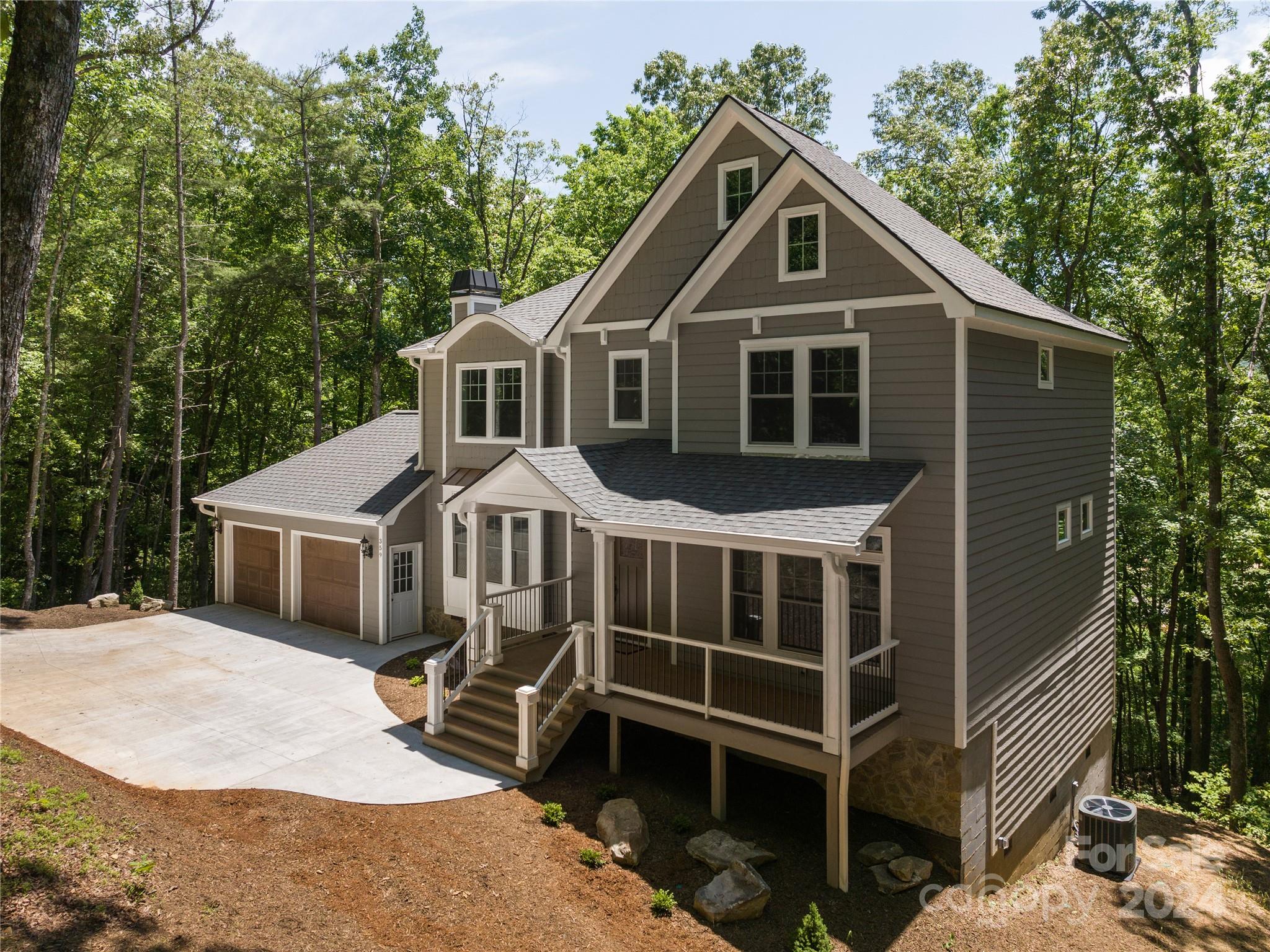 359 Tiptop Road Brevard, NC 28712 - Photo 48 of 48 a front view of a house with a yard