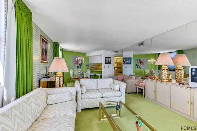 a view of a balcony with wooden floor