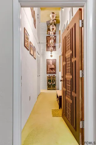 a kitchen with cabinets and white appliances