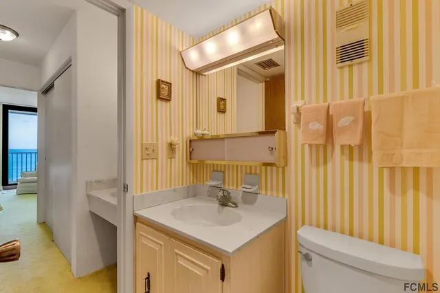 a view of a large building with a window