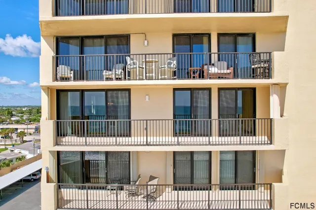 a view of a couch and table in a patio