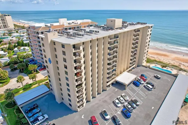 a view of a balcony with an ocean view