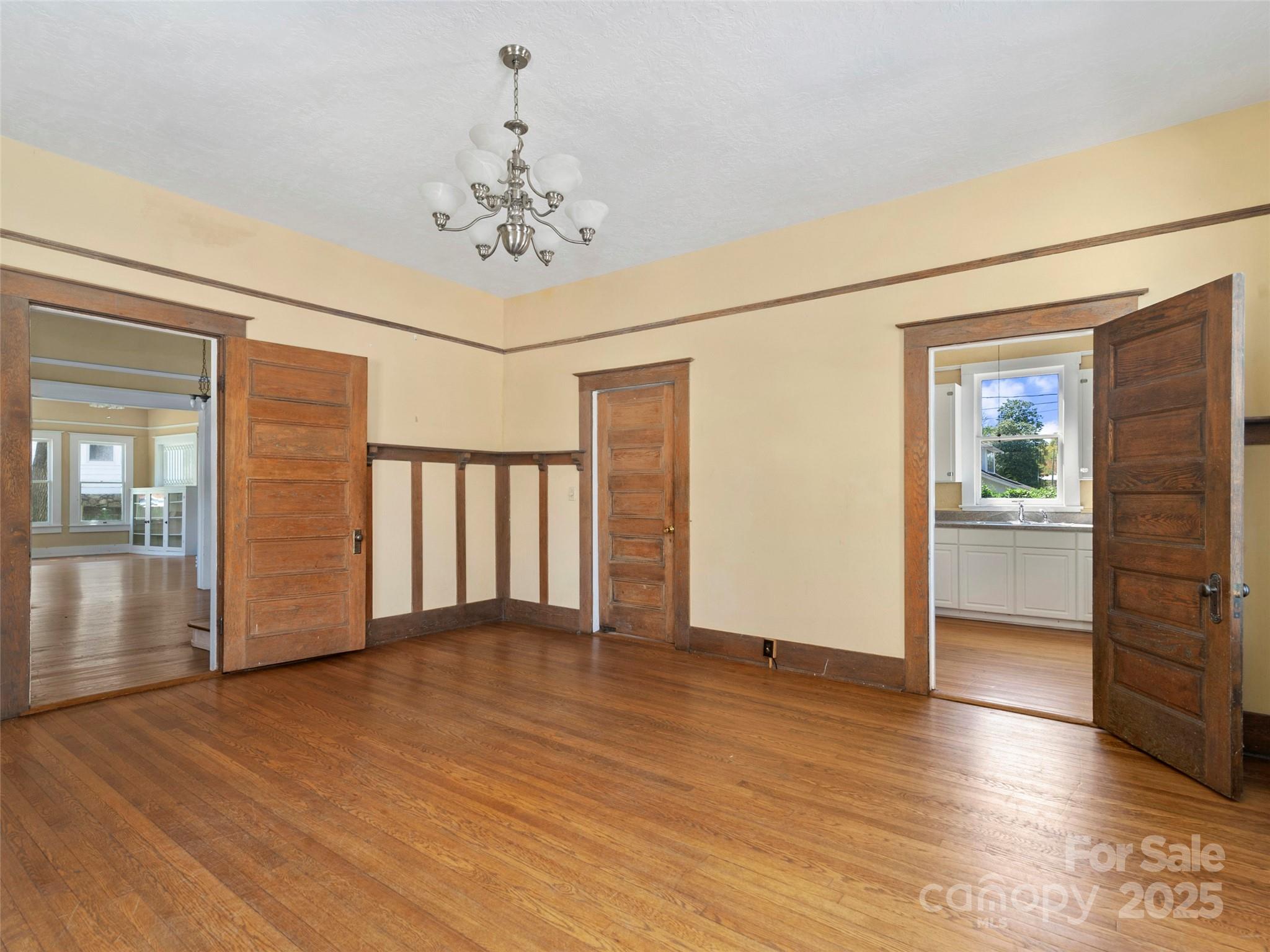 99 Walnut Street Waynesville, NC 28786 - Photo 15 of 34 a view of a livingroom with wooden floor
