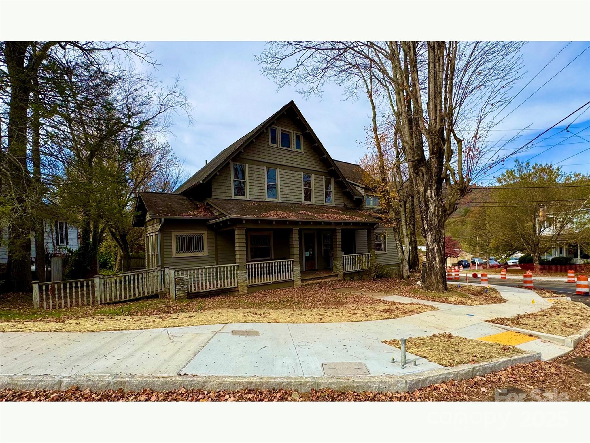 99 Walnut Street Waynesville, NC 28786 - Photo 2 of 34 a house view with a outdoor space