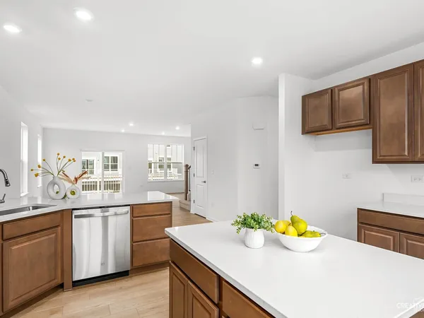 a kitchen with a sink and cabinets