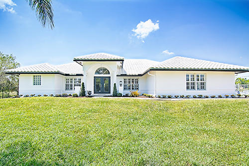 9362 154th Road North Jupiter, FL 33478 - Photo 1 of 26 front of the home
