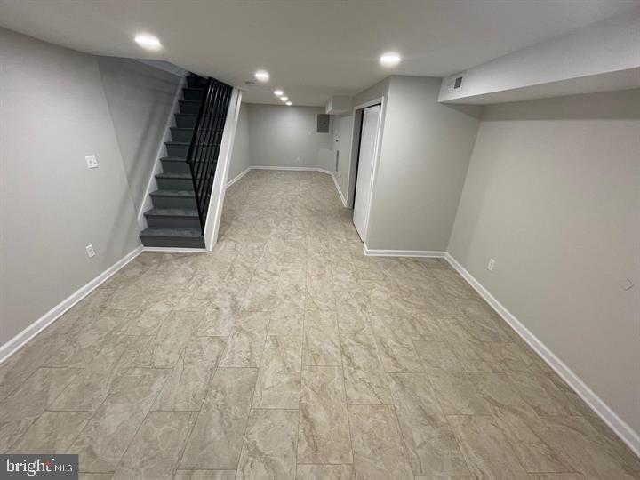 4458 North 20th Street Philadelphia, PA 19140 - Photo 11 of 14 Spacious, modern basement with sleek finishes.