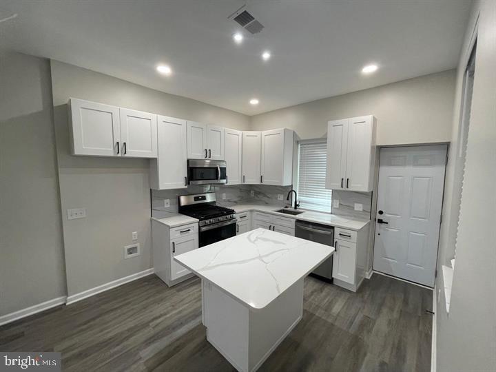 4458 North 20th Street Philadelphia, PA 19140 - Photo 4 of 14 Modern kitchen with sleek finishes.