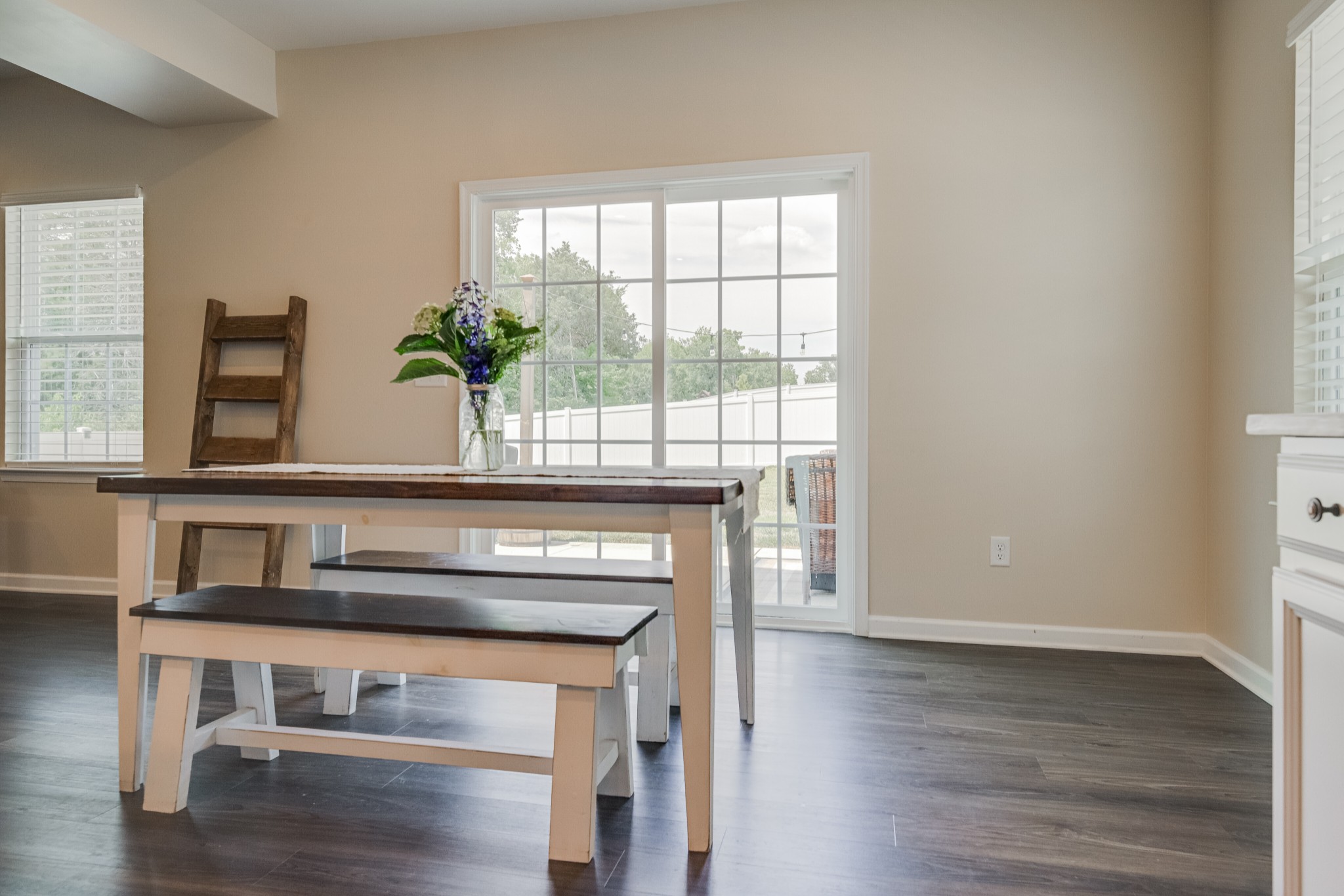 646 Castle Road Mount Juliet, TN 37122 - Photo 14 of 31 a living room with wooden floor and a potted plant