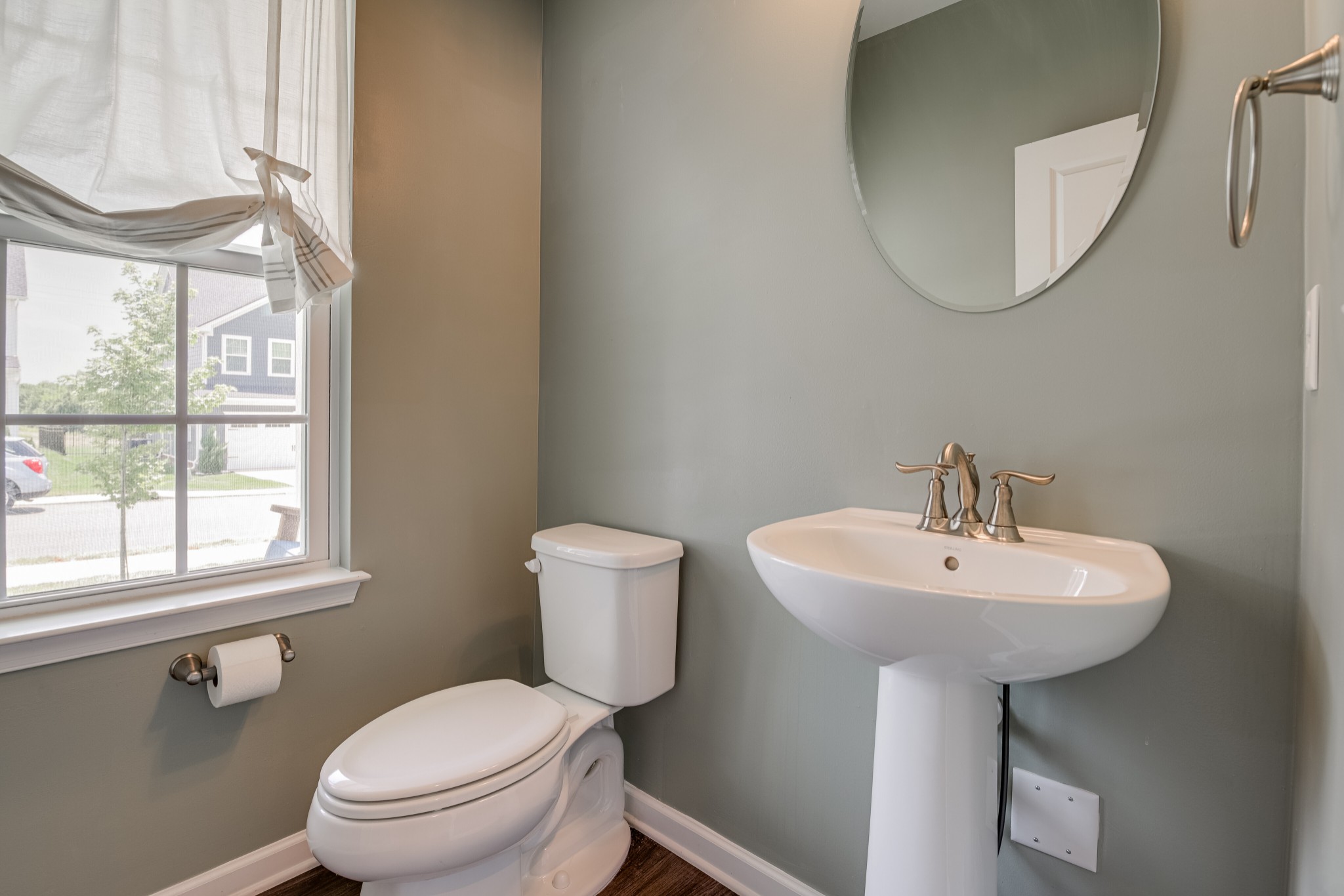 646 Castle Road Mount Juliet, TN 37122 - Photo 16 of 31 a bathroom with a sink a mirror and a toilet