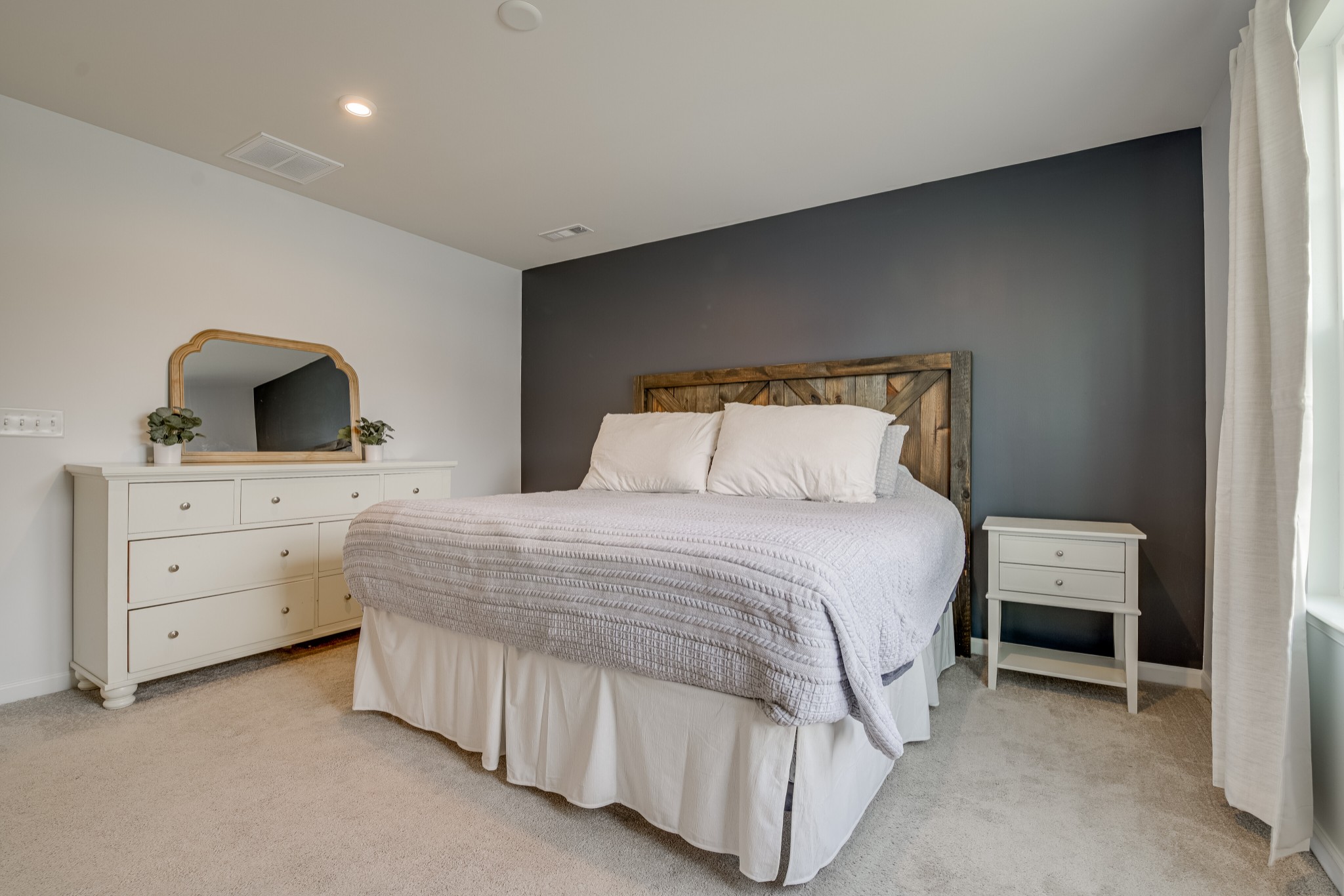 646 Castle Road Mount Juliet, TN 37122 - Photo 20 of 31 a bedroom with a bed and a dresser