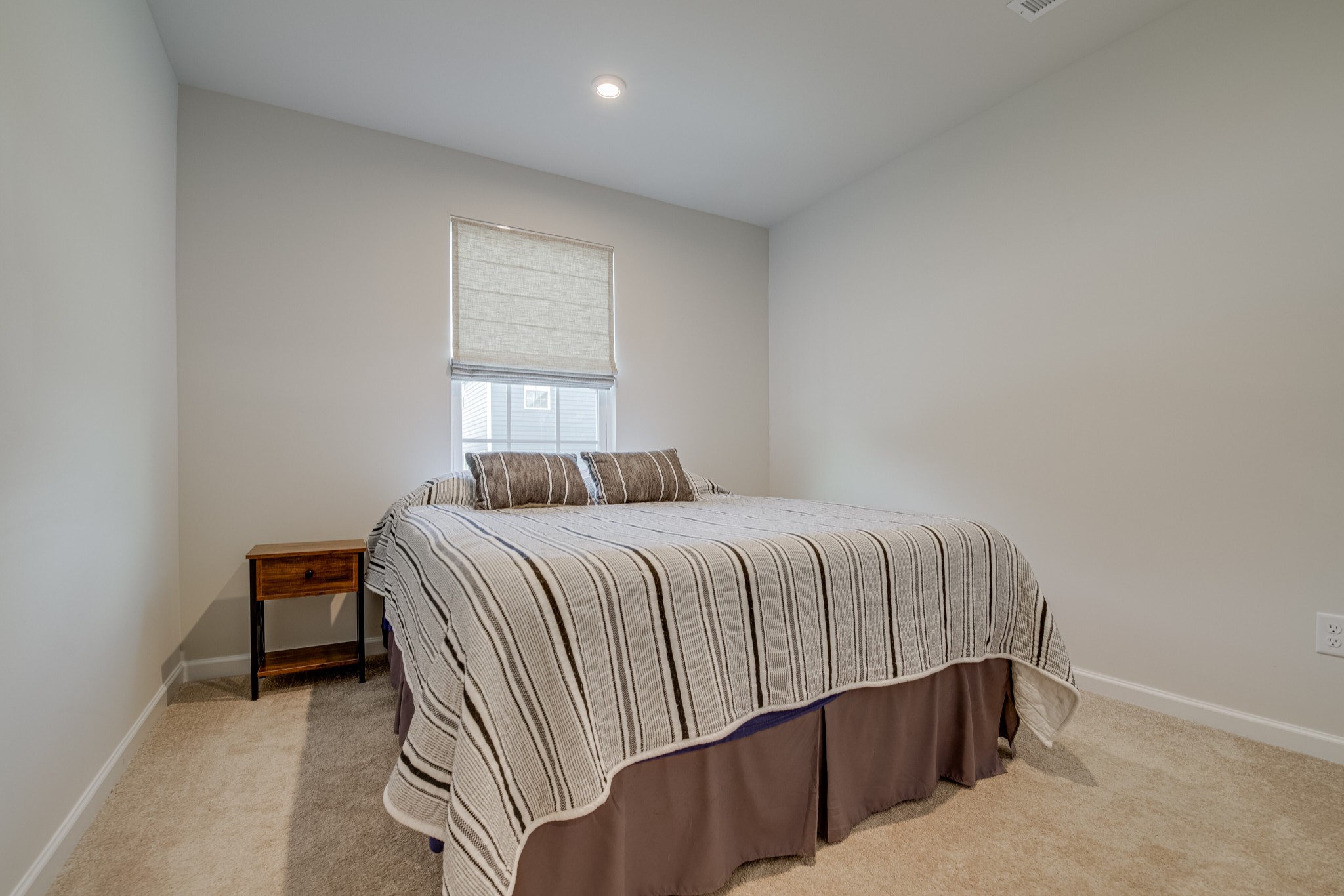 646 Castle Road Mount Juliet, TN 37122 - Photo 23 of 31 a bedroom with a bed and window