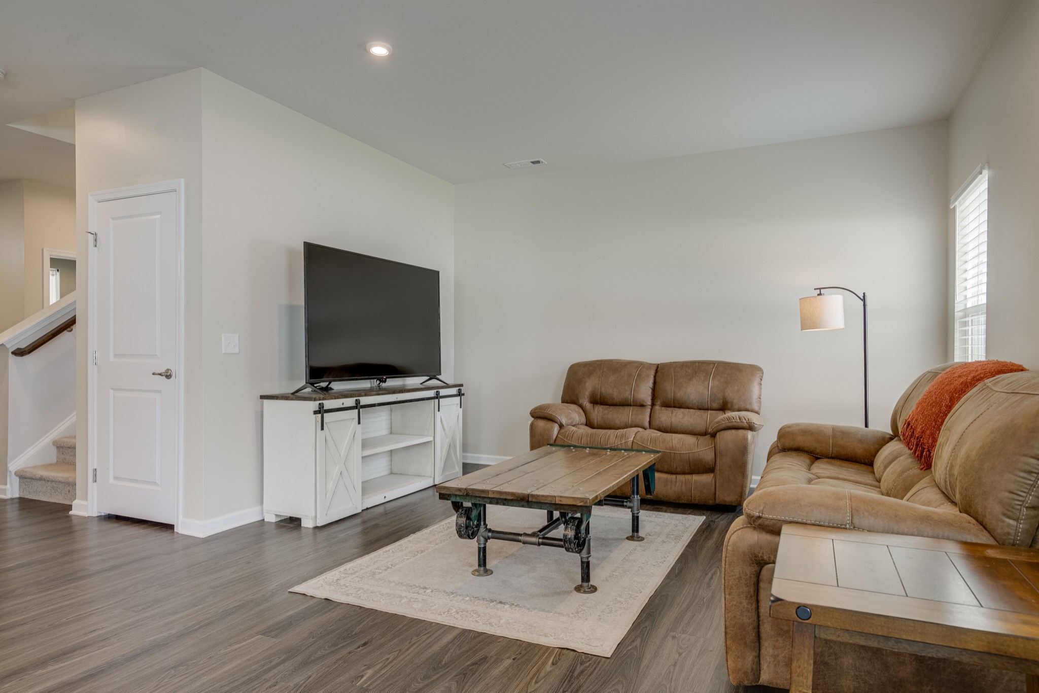 646 Castle Road Mount Juliet, TN 37122 - Photo 7 of 31 a living room with furniture and a flat screen tv