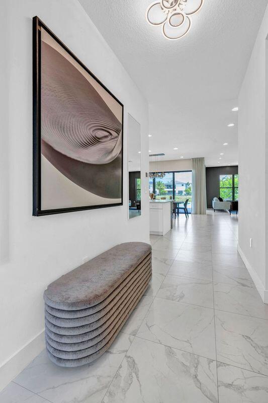 8239 Oceanus Drive Boca Raton, FL 33496 - Photo 3 of 26 Vk-e1VUQ