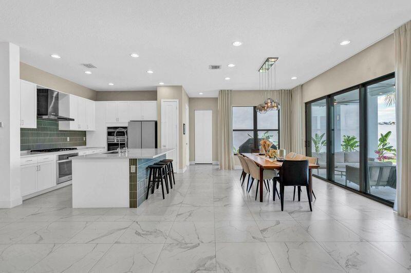 8239 Oceanus Drive Boca Raton, FL 33496 - Photo 7 of 26 QoWA9eUU