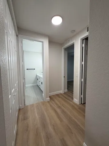 a view of a room with a wardrobe space