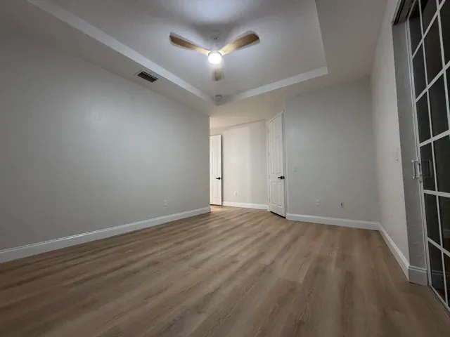 a view of an empty room with a window