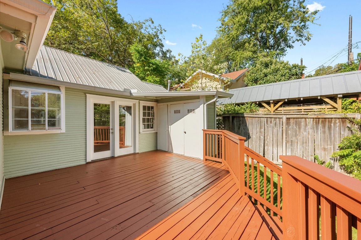 516 Lockhart Drive Austin, TX 78704 - Photo 19 of 25 a view of a house with wooden deck and furniture