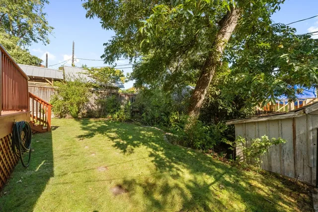 a view of a lake with a house in the background