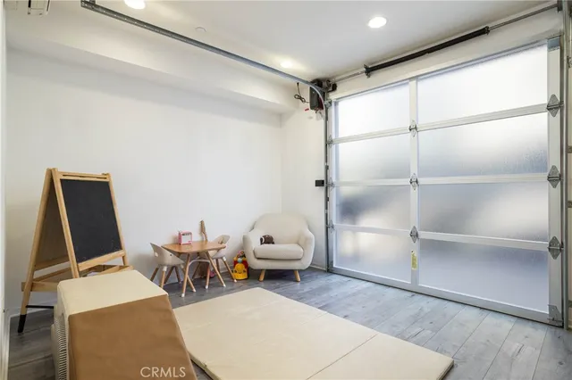 a room with a couch and a desk