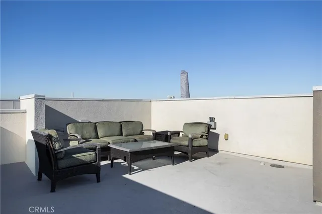a view of a kitchen with a sink cabinets and a wooden floor