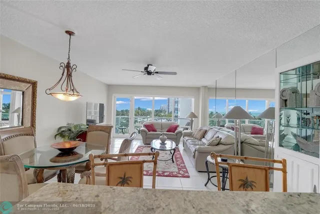 a bedroom with furniture and a wooden floor