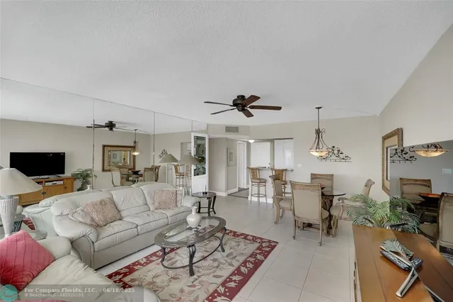 a bedroom with a bed a window and dresser