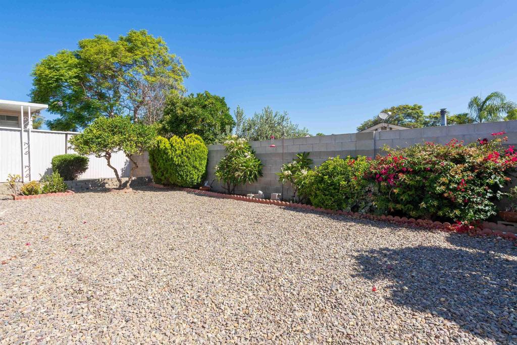 650 South Rancho Santa Fe Road, Unit 54 San Marcos, CA 92078 - Photo 14 of 21 Nice size backyard & all landscaping is on a timed drip system. Mature lemon and orange tree!