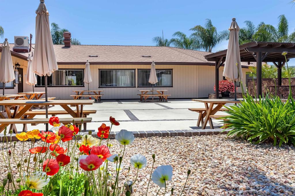 650 South Rancho Santa Fe Road, Unit 54 San Marcos, CA 92078 - Photo 19 of 21 Just outside the main clubhouse.