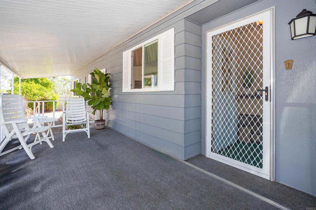 650 South Rancho Santa Fe Road, Unit 54 San Marcos, CA 92078 - Photo 2 of 21 Side Porch provides entrance to the front door.