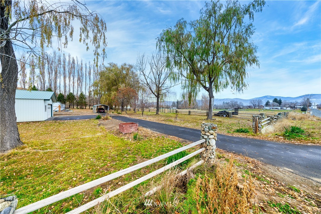 25 Caudill Road Omak, WA 98841 - Photo 5 of 40 a view of swimming pool with outdoor seating and plants