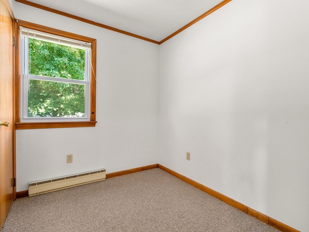 16 May Road Ludlow, MA 01056 - Photo 16 of 28 a view of an empty room with a window