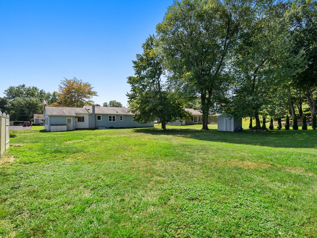 16 May Road Ludlow, MA 01056 - Photo 20 of 28 a front view of a house with garden