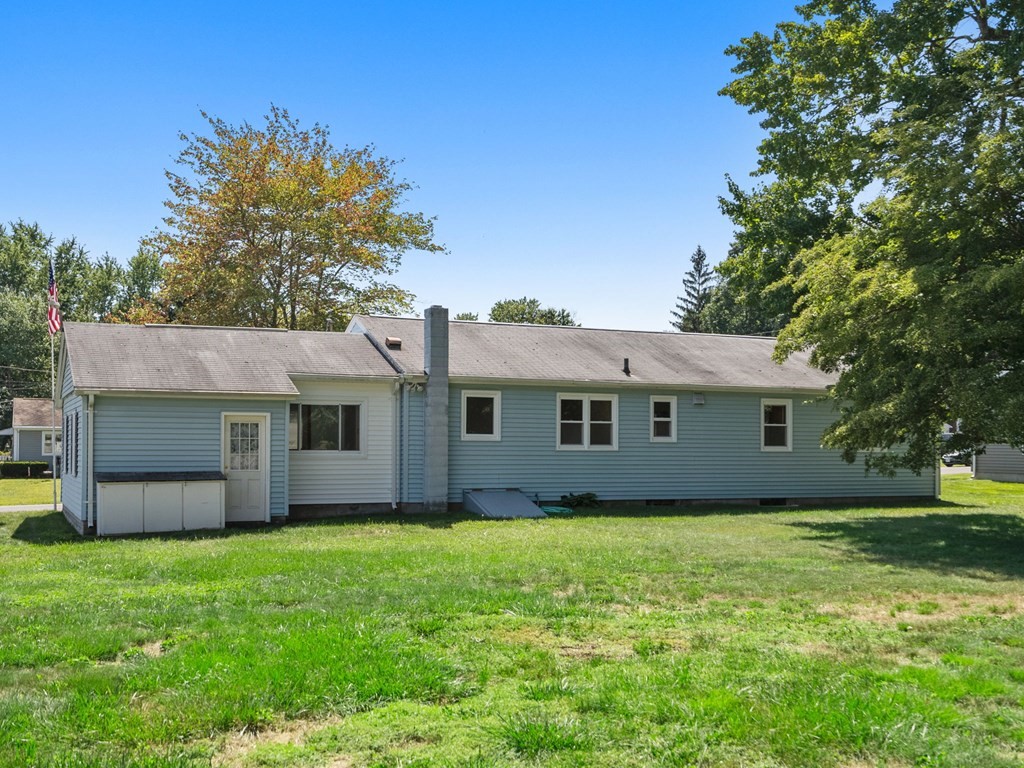 16 May Road Ludlow, MA 01056 - Photo 21 of 28 a view of a house with yard and a garden