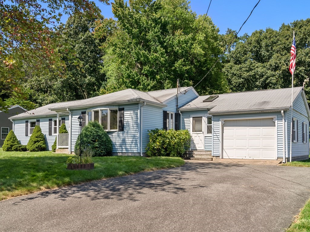 16 May Road Ludlow, MA 01056 - Photo 27 of 28 a front view of a house with a garden